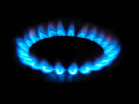 burner with gas, on a black background horizontal photo,の写真素材