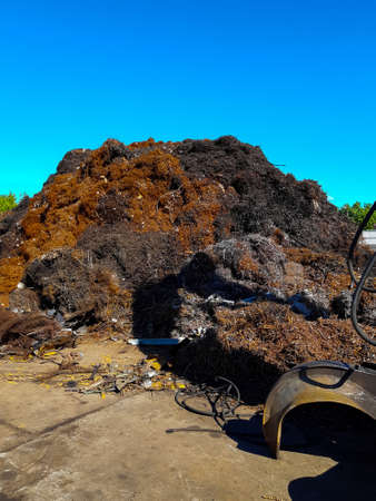 metal shavings, scrap metal, a mountain of metal shavingsの写真素材
