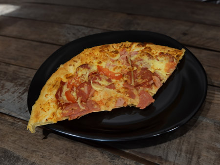 Pizza with salami sausage, mozzarella cheese, mushrooms, black olives, spicy tomato sauce and arugula, rustic wooden table background, top view.の写真素材