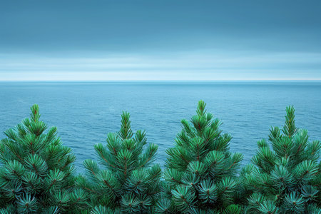 Evergreen trees provide a stunning view of a tranquil ocean, reflecting soft blue hues during dusk, creating a peaceful atmosphere.の素材