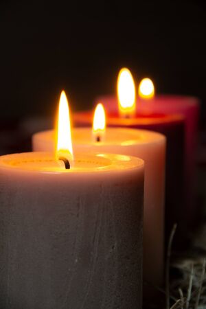 Plain Christmas decoration with four candles in a rowの写真素材
