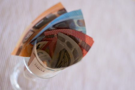 Savings concept background with euro banknotesの写真素材