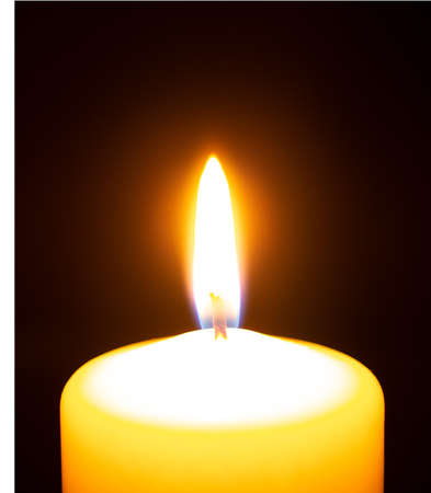 Burning big yellow candleの写真素材