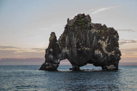 Icelandic tourist attraction Hvitserkur at sunsetの写真素材