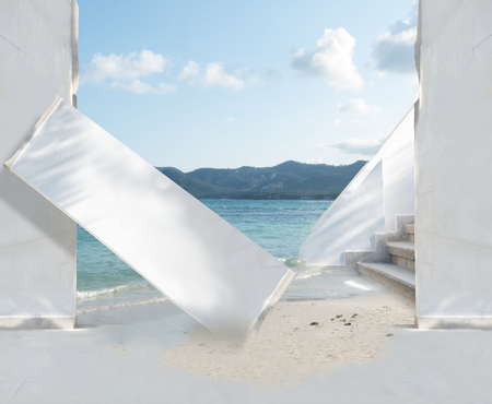 white building entrance door at oceanの写真素材