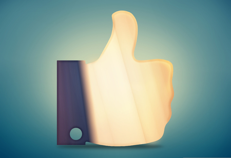 light bright vibrant golden thumbs upの写真素材
