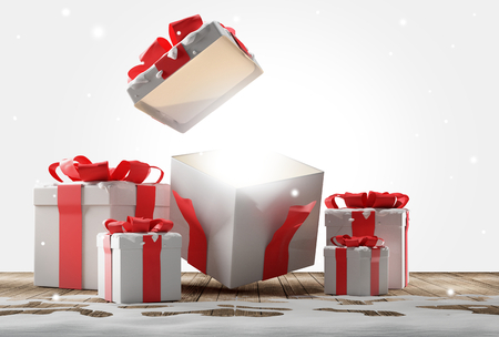 open christmas present surprise and christmas presents with snow 3d-illustrationの写真素材