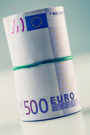 Rolled euro banknotes several thousand.Free space for your economic informationの写真素材