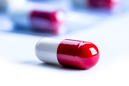 Pills and tablets.Blue background.の写真素材