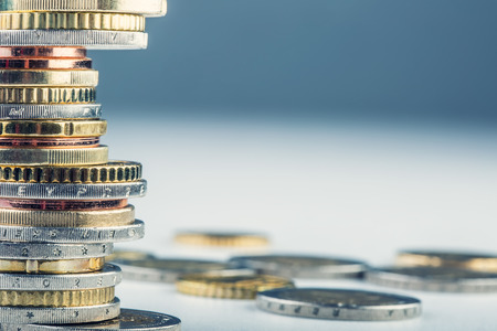 Euro coins. Euro money. Euro currency.Coins stacked on each other in different positions. Money conceptの写真素材