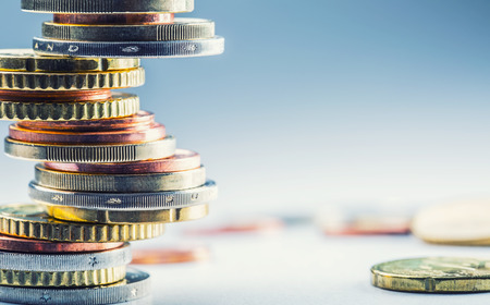 Euro coins. Euro money. Euro currency.Coins stacked on each other in different positions. Money concept. Euro coins. Euro money. Euro currency.Coins stacked on each other in different positions. Money concept.