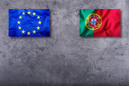 Flags of the Portugal and the European Union on concrete background.の写真素材
