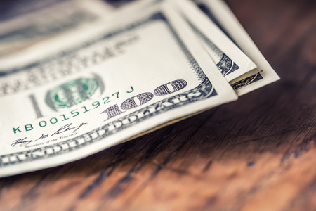 Dollars banknotes closeup. Cash Money American Dollars.Close-up view of stack of US dollars.の写真素材