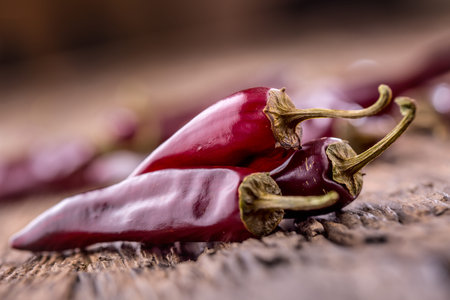 Chili.Red chili peppers on wooden table. Selective focus.の写真素材