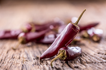Chili.Red chili peppers on wooden table. Selective focus.の写真素材