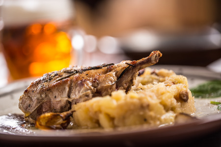 Iberian cutlet with mashes potatoes decoration and draft beere in pub or restaurant.の写真素材