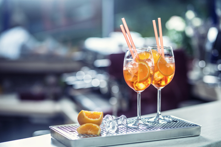 Aperol spritz drink on bar counter in pub or restaurant.の写真素材