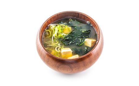 Miso soup japanese traditional meal in wooden bowl isolated on white background.の写真素材