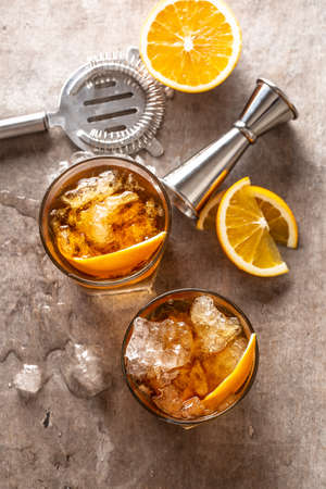 Cocktail Old fashioned Negroni with orange on the bar counter - top of view.の写真素材