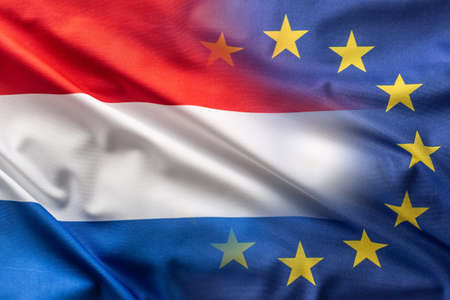 Flags of Netherlands adnd EU blowing in the wind.