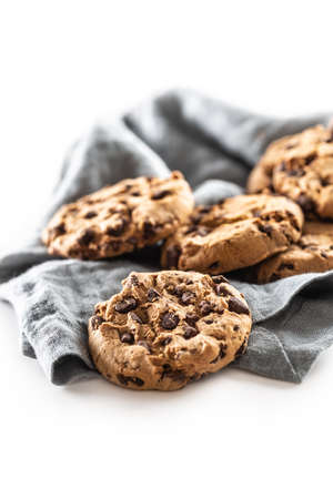Cookies with chocolate pieces isolated on white background.