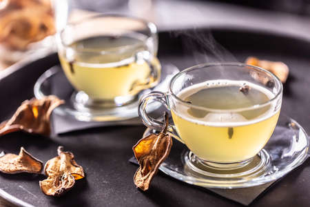 Whiskey drink Hot Teddy with dried pears. Mulled wine flavored with cloves and orange peel.の写真素材