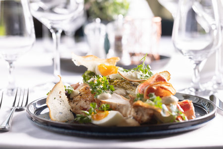 Chicken breasts served as low carb and high protein meal with eggs, ham and vegetables.の写真素材