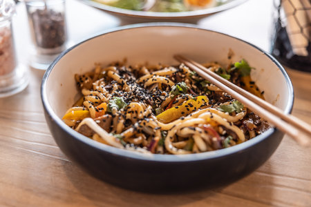 Udon noodles with beef meat served in asian restaurant.の写真素材