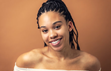 Portrait of African American girl with afro hair. Beauty, cosmetics, makeup and fashion concept.の写真素材