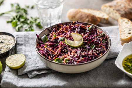 Healthy salad of red cabbage, carrots, coriander and sesame.  Healthy eating, vegan food concept.の写真素材