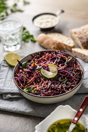 Healthy salad of red cabbage, carrots, coriander and sesame.  Healthy eating, vegan food concept.の写真素材