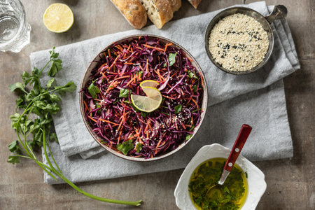 Healthy salad of red cabbage, carrots, coriander and sesame - Top of view.  Healthy eating, vegan food concept.の写真素材