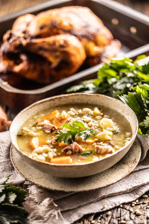 Soup made from barley groats, smoked pork neck, potatoes and root vegetables.の写真素材