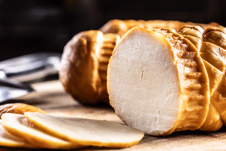 Oscypki - Traditional salty smoked cheese made from sheep's milk from the Polish region of Zakopane under the High Tatras - close up.の写真素材