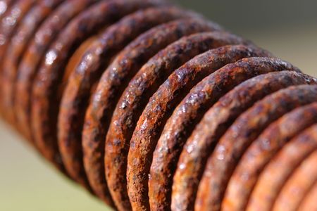 Macro of a rusty spring (Shallow depth of field)の写真素材