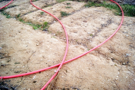 Red plastic pipe の写真素材