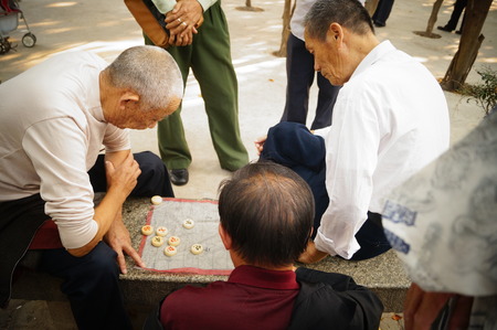 The old people in the Chinese chess, very happy, in Shenzhen, China