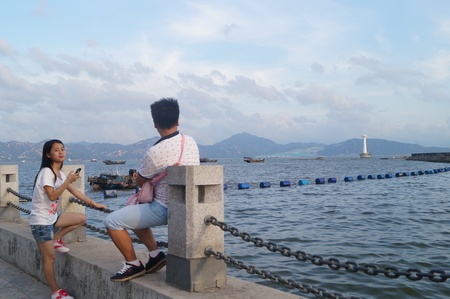 People on the sea bankのeditorial素材