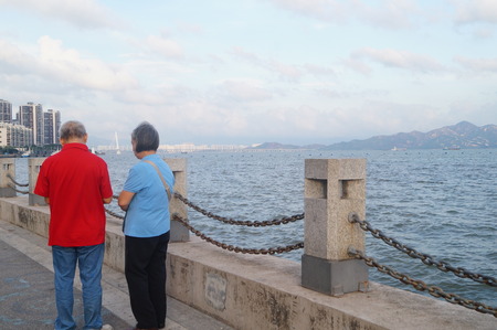 Old man stadning beisde the seaのeditorial素材