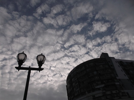 Blue sky and white clouds and street lampsのeditorial素材
