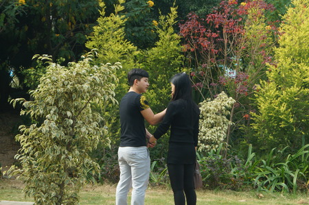  young couple in a park in Shenzhenのeditorial素材