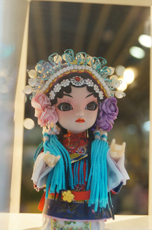 Close-up of small silk Peking opera decorative dollのeditorial素材