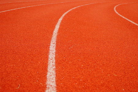 Red plastic track and field trackの写真素材
