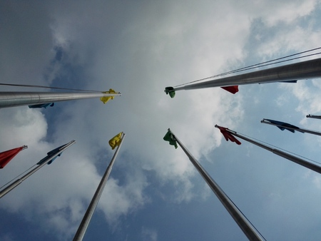 Color flag and flagpole building landscape
