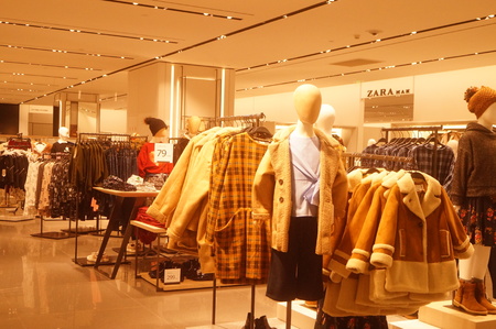 Clothing store interior landscape, newly listed clothing. At Yi Fang Cheng shopping center, Baoan, Shenzhen, china.のeditorial素材