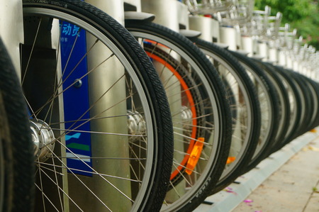 Public bike rental facilities and display of bicycle close-ups. In shenzhen, China.