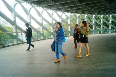 Pedestrian bridge landscape, pedestrians, in Shenzhen deep South Avenue, China