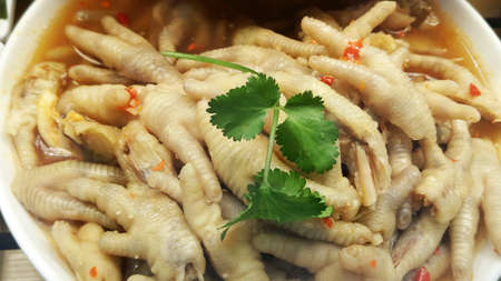Spicy delicious food with duck feet and chicken feetの写真素材