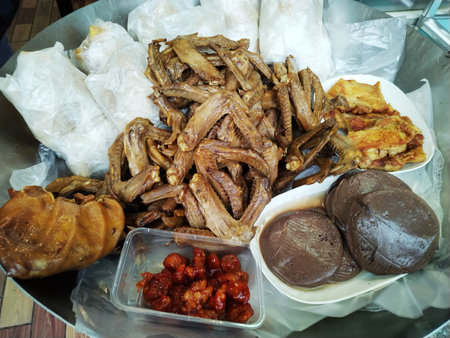 Thai food in the market, fried pork and fried chicken.の写真素材