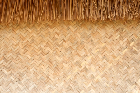 bamboo texture, weave bamboo Thai pattern have straw on top for backgroundの写真素材
